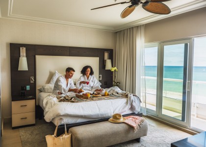 a man and woman in a hotel room
