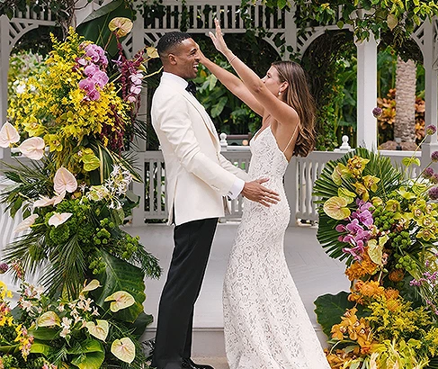 a man and woman in a white dress