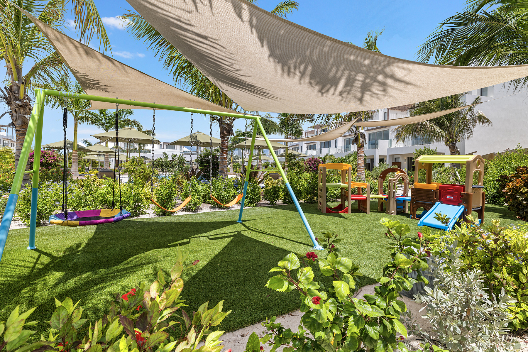a playground with a shade structure