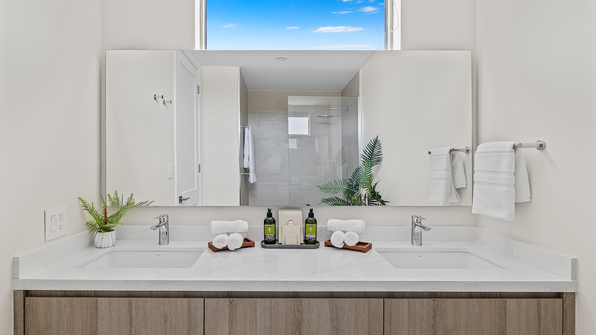 a bathroom with a large mirror