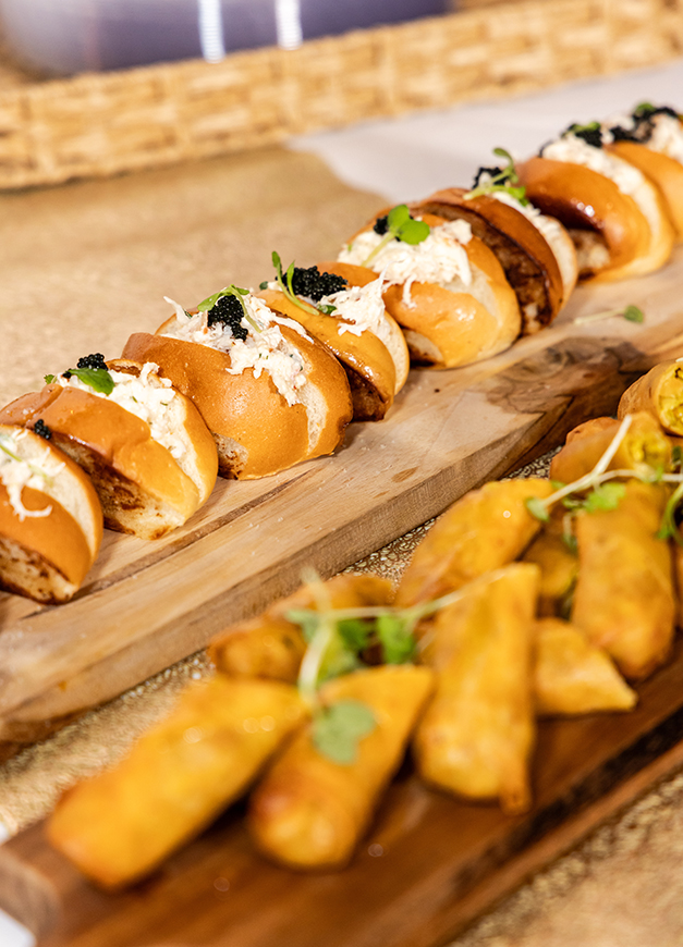 a group of food on a wooden board