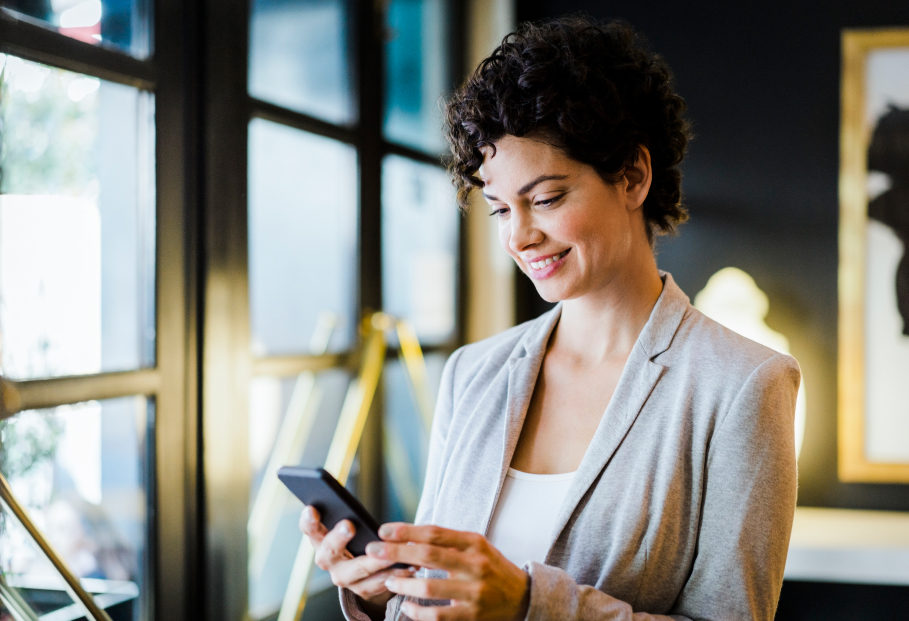 a woman looking at a phone