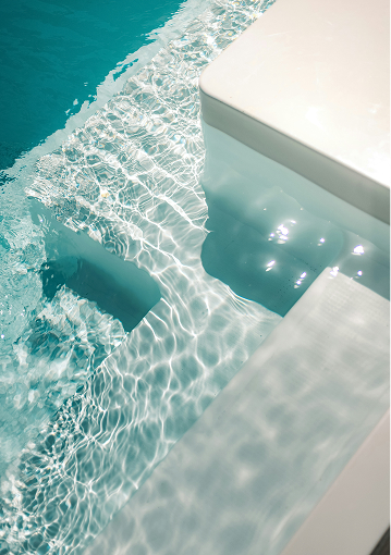 a pool with water and steps