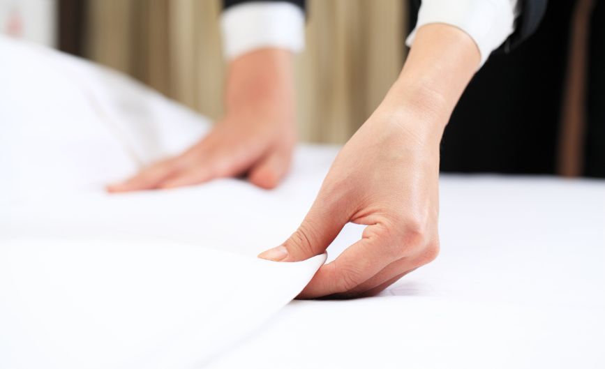 a hand holding a sheet