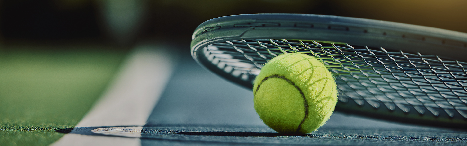 a tennis ball and a racket