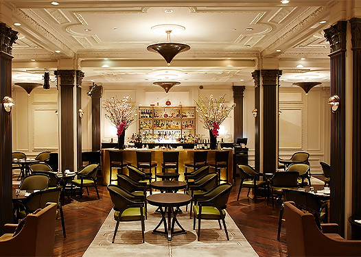 a room with tables and chairs