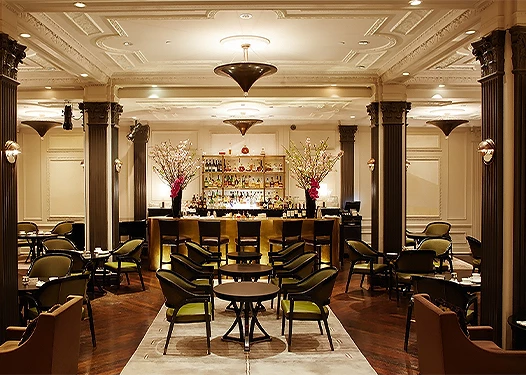 a room with tables and chairs