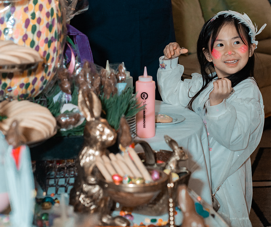 a girl with pink face paint