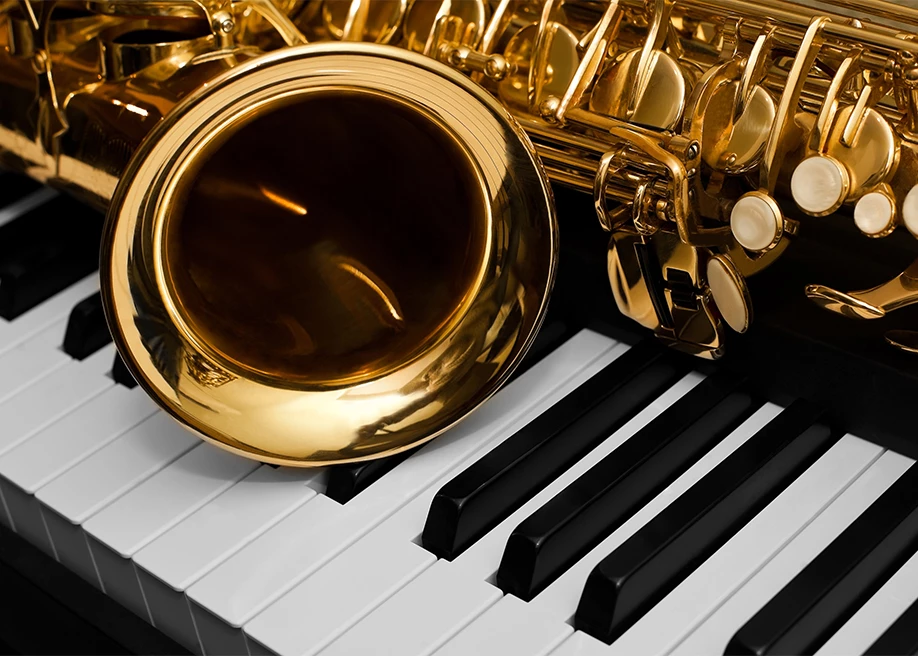 a saxophone on a piano