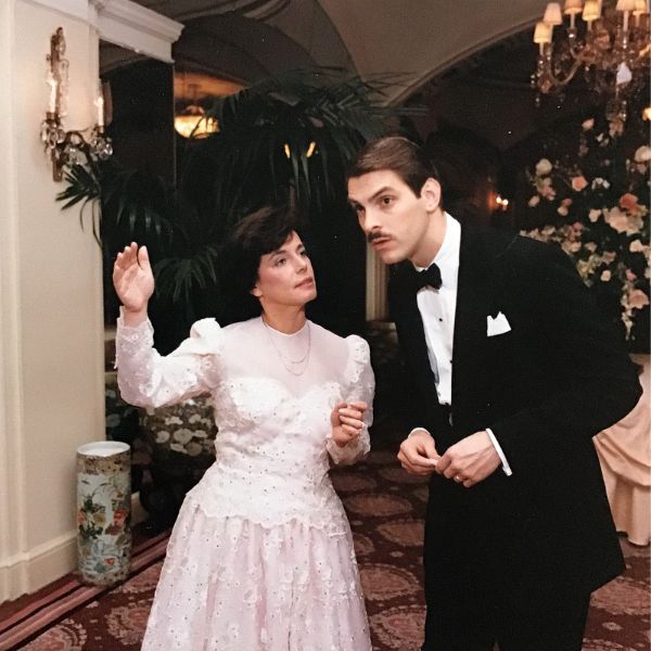 a man and woman dancing in a room