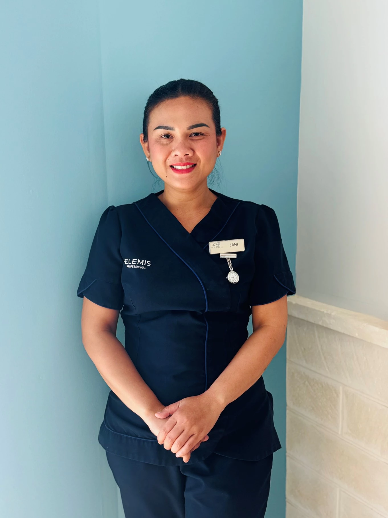 a woman in a black uniform