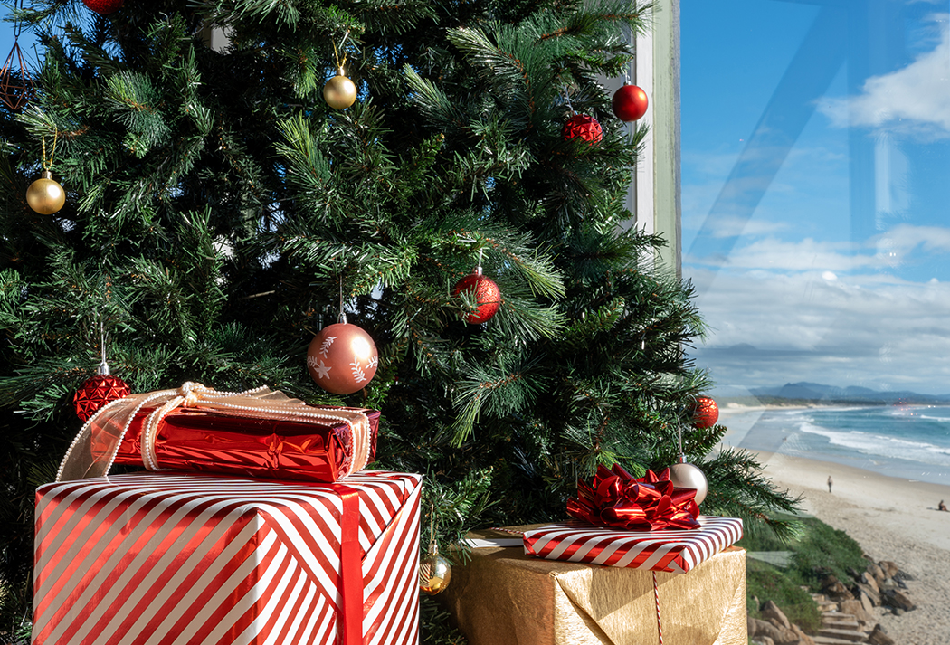 presents wrapped presents under a christmas tree