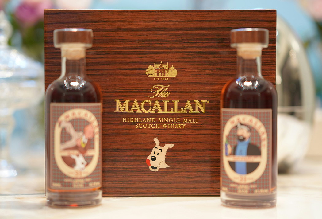 bottles of scotch whisky in a wooden box