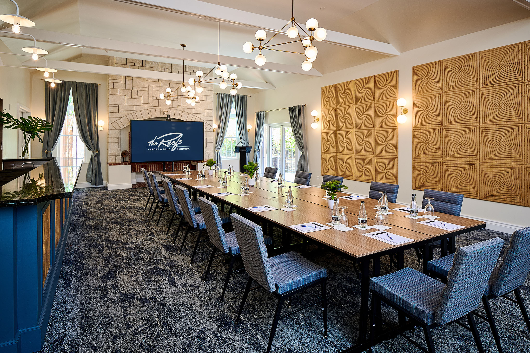 a room with a large table and chairs