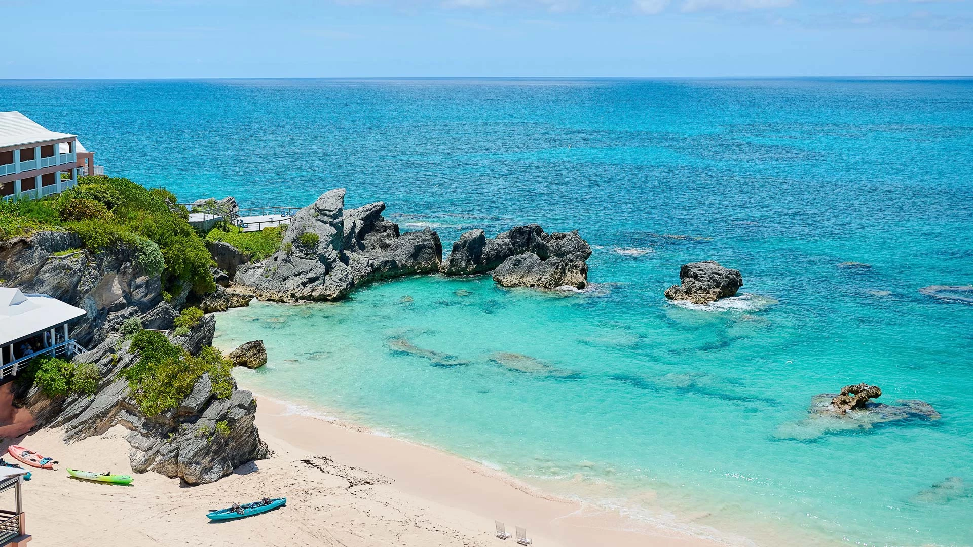 a beach with rocks and water