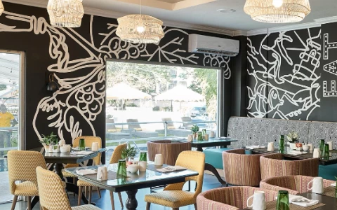 a restaurant with tables and chairs