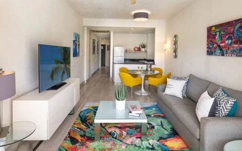 a living room with a couch and a table