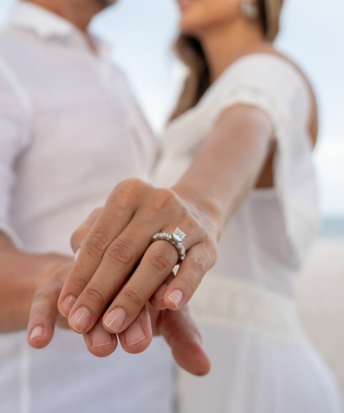 a man and woman holding hands