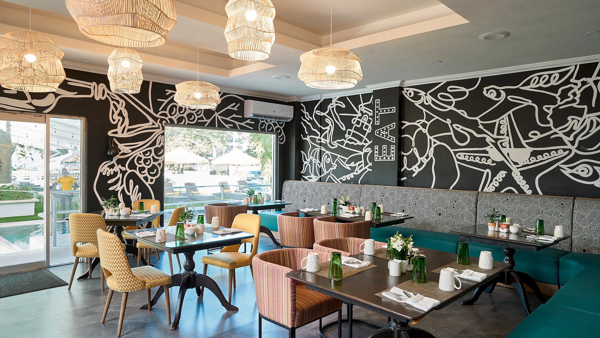 a restaurant with tables and chairs