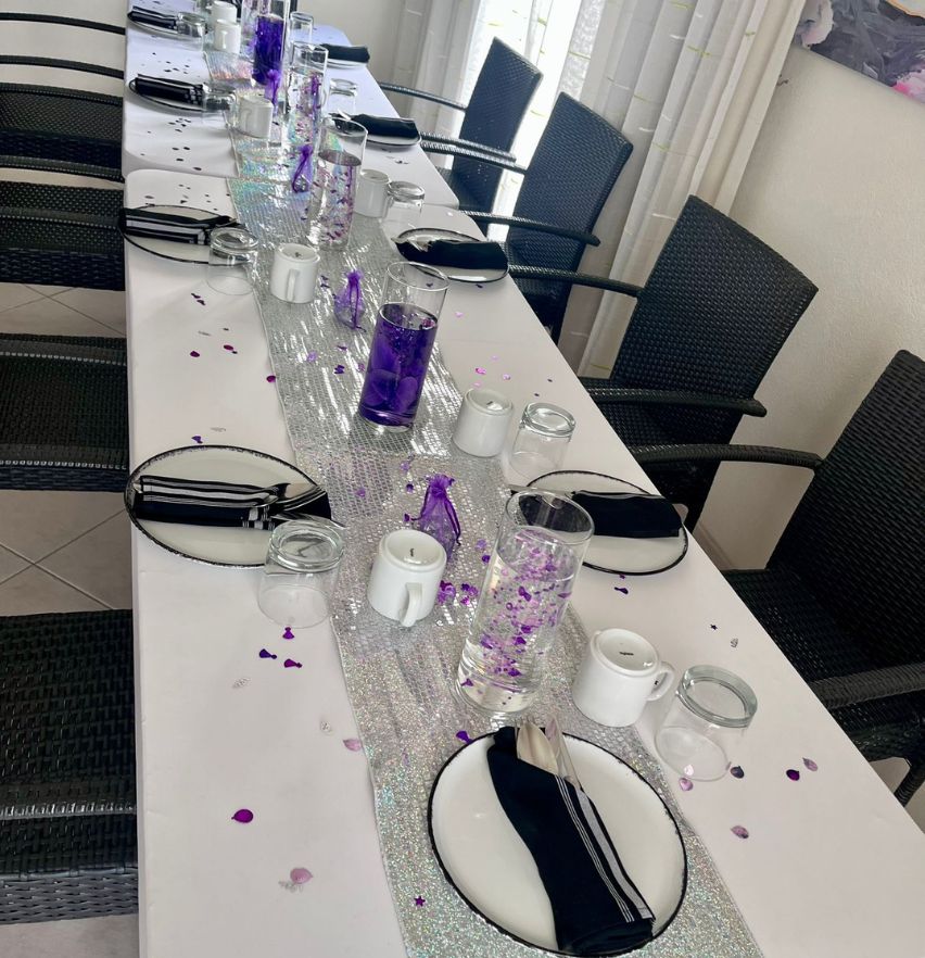 a table with plates and glasses on it