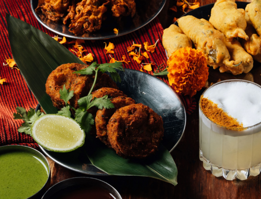 indian dishes and bombay sour cocktail