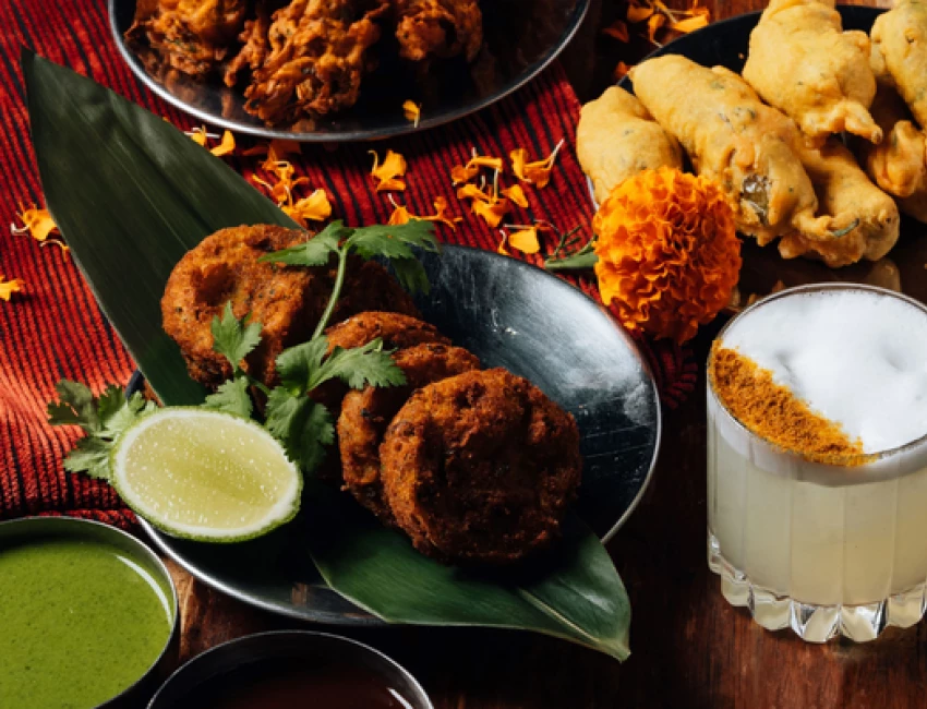 indian dishes and bombay sour cocktail
