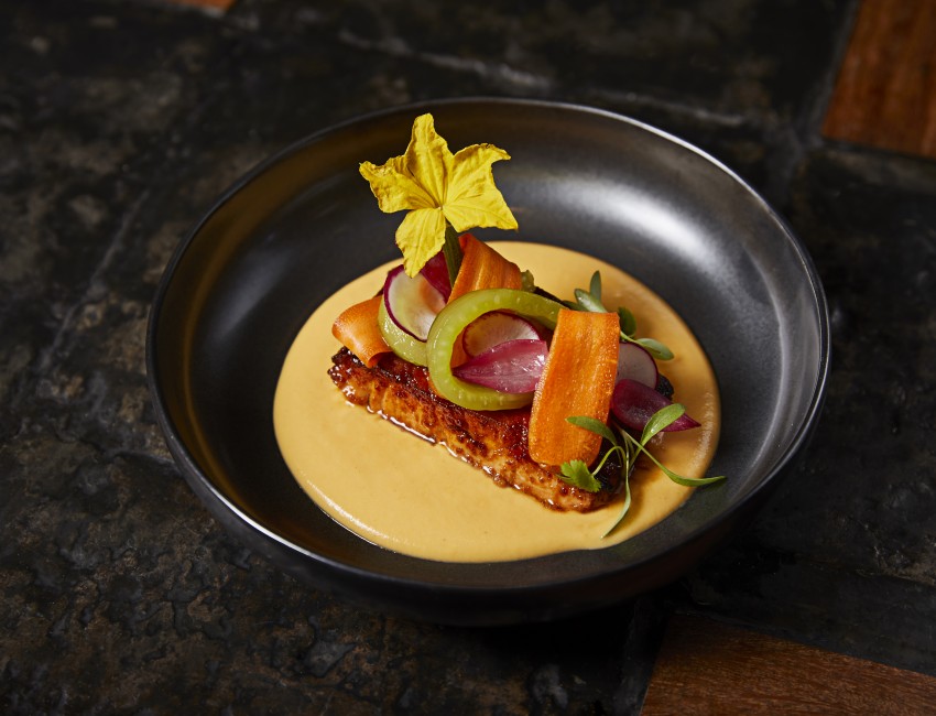 salmon with vegetables in a soup