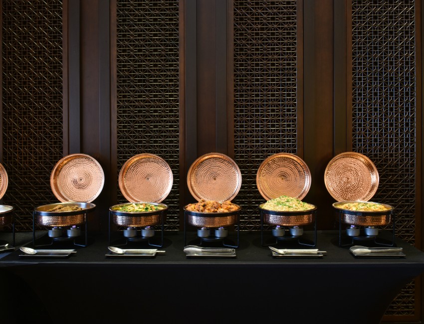 catering style platters in line for a buffet
