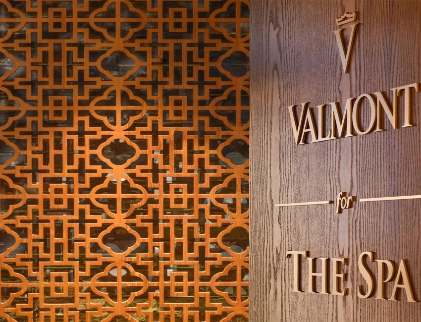 the valmont sign on a wooden wall