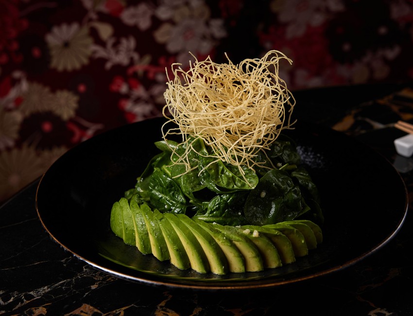 a plate of food on a marble surface