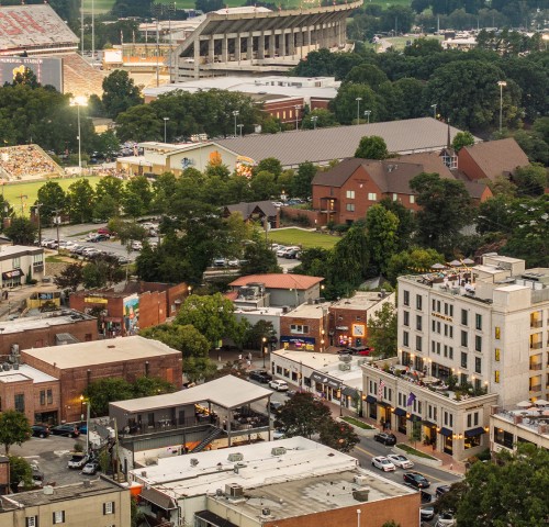 a city with many buildings and trees