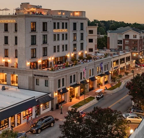 a building with lights on the roof