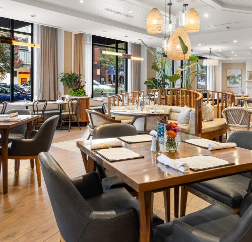 a restaurant with tables and chairs