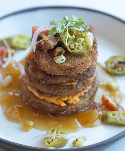 a stack of food on a plate