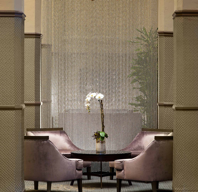 a room with chairs and a table