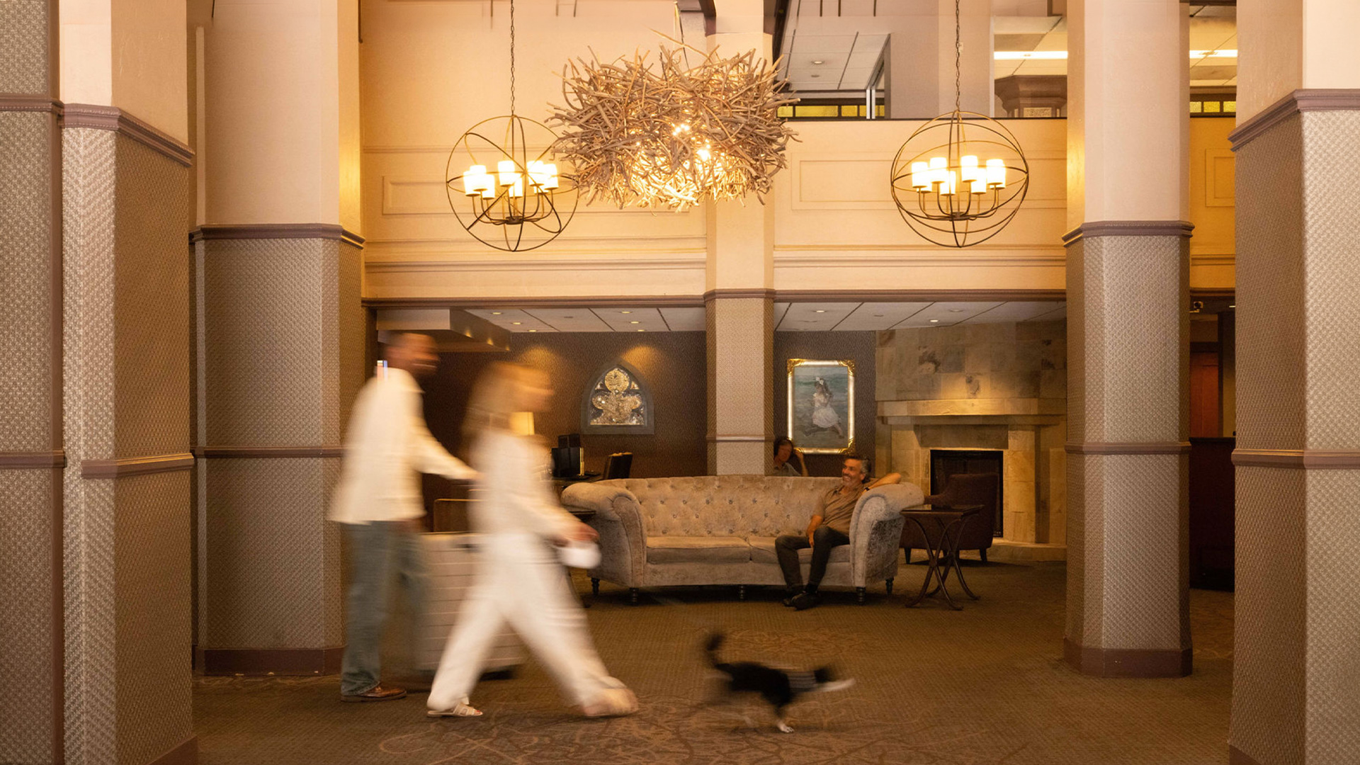 a group of people in a lobby