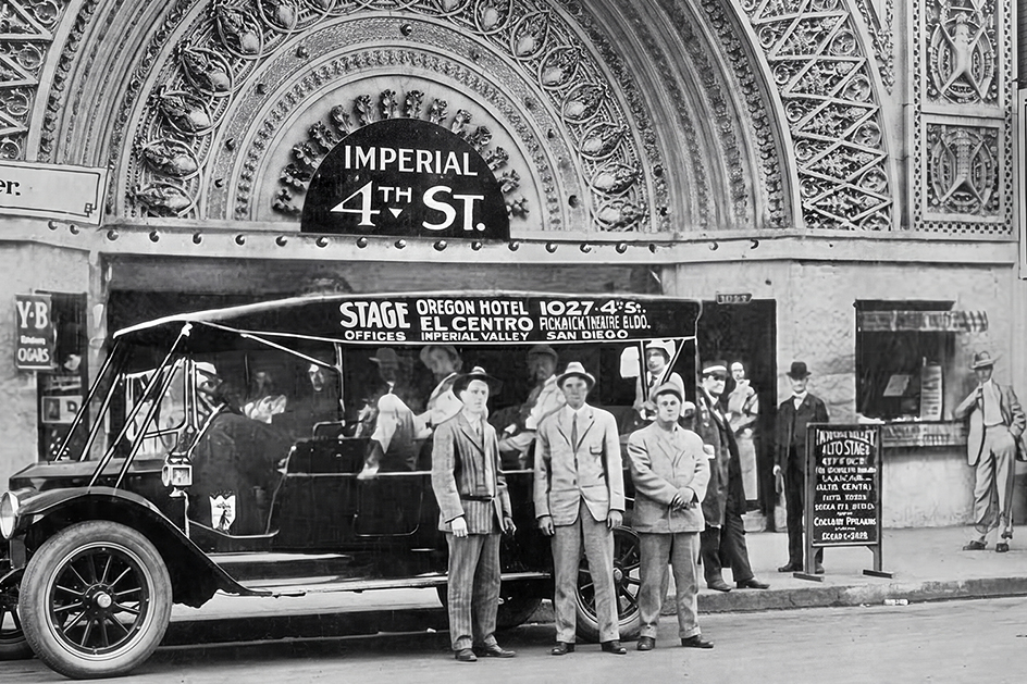 a group of men standing in front of a building