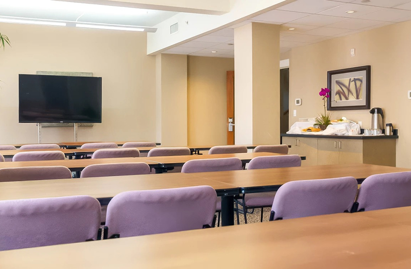 a room with tables and chairs