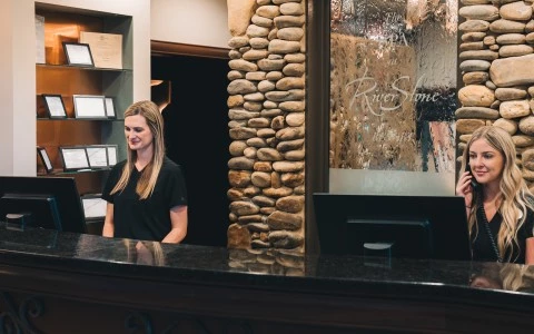 a woman standing at a counter