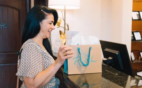 a woman opening a bag