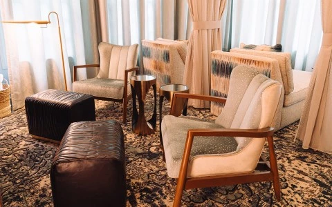 a room with chairs and tables