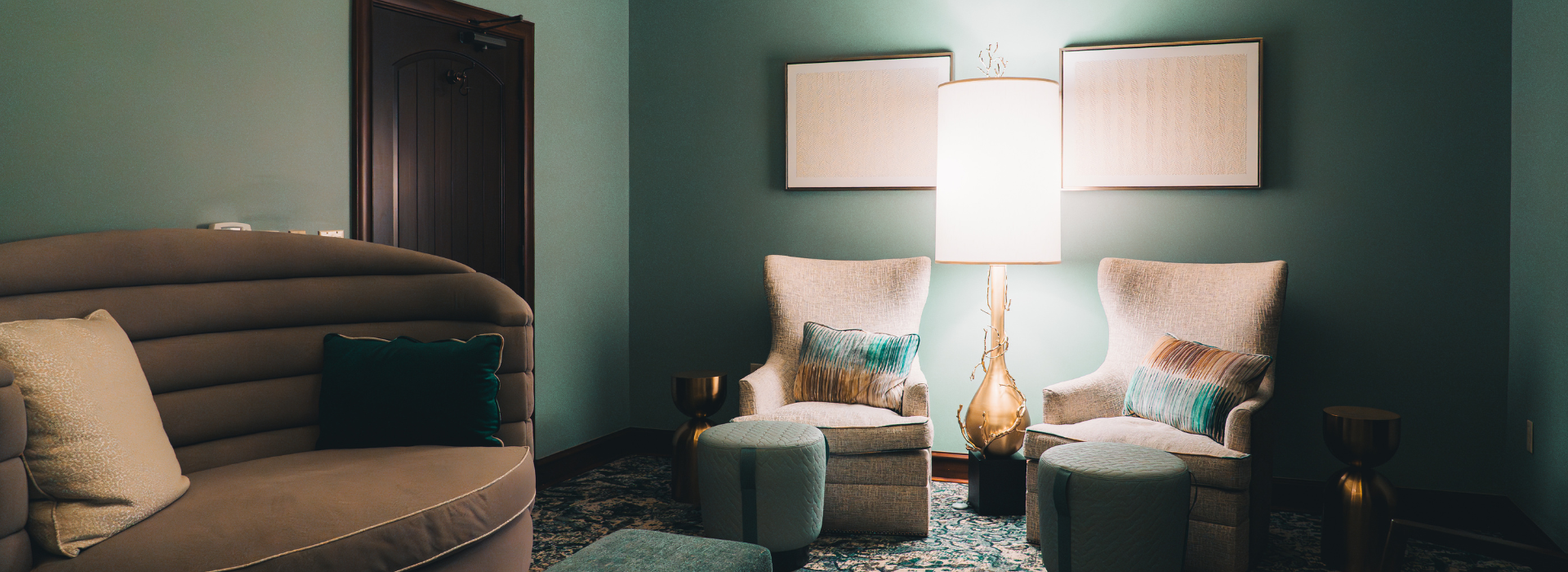 a room with a chair and a lamp