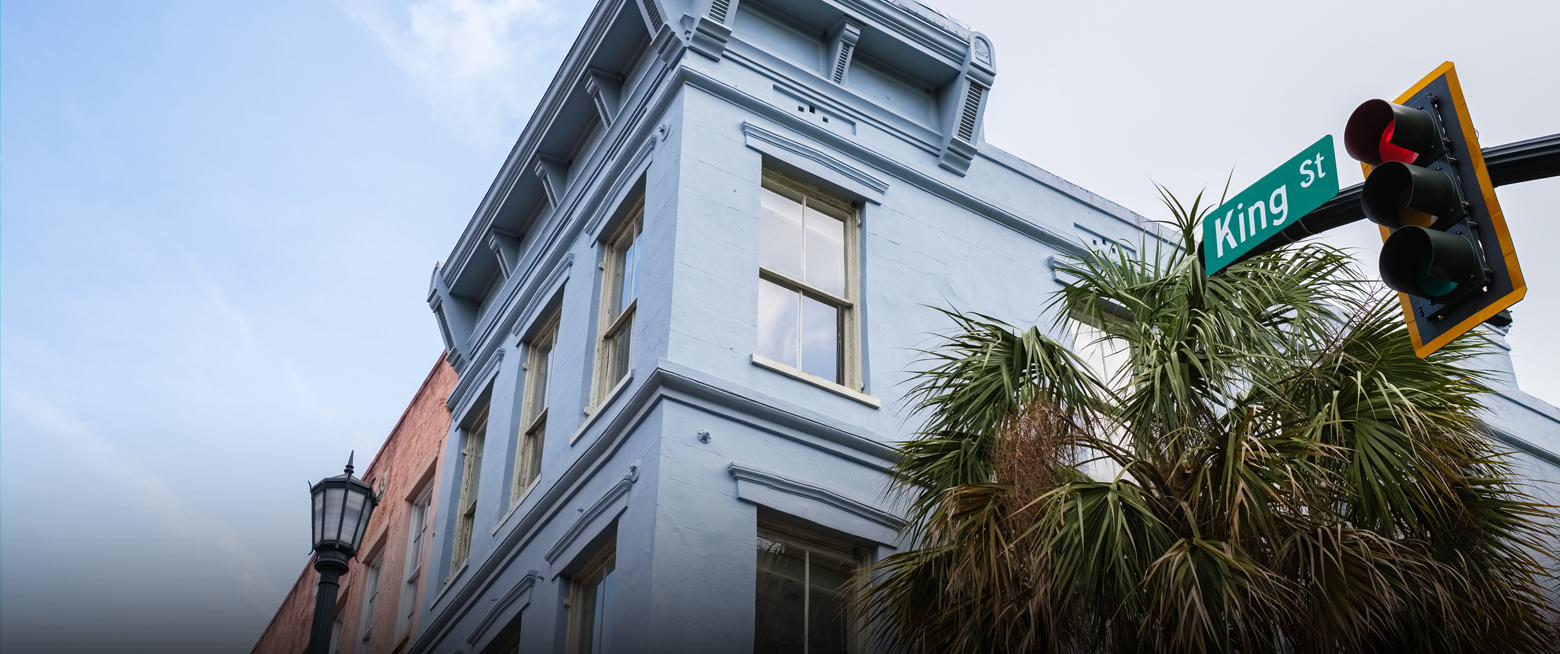 a building with a palm tree