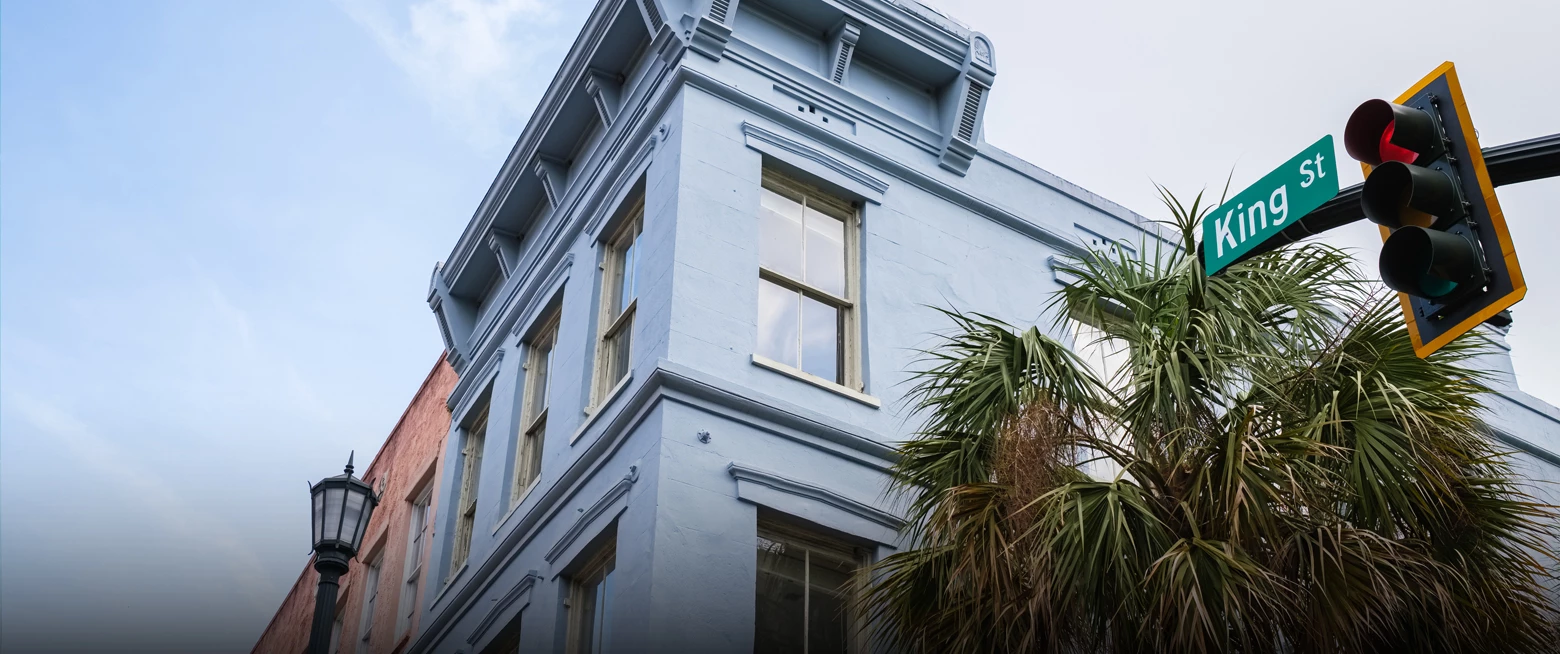 a building with a palm tree