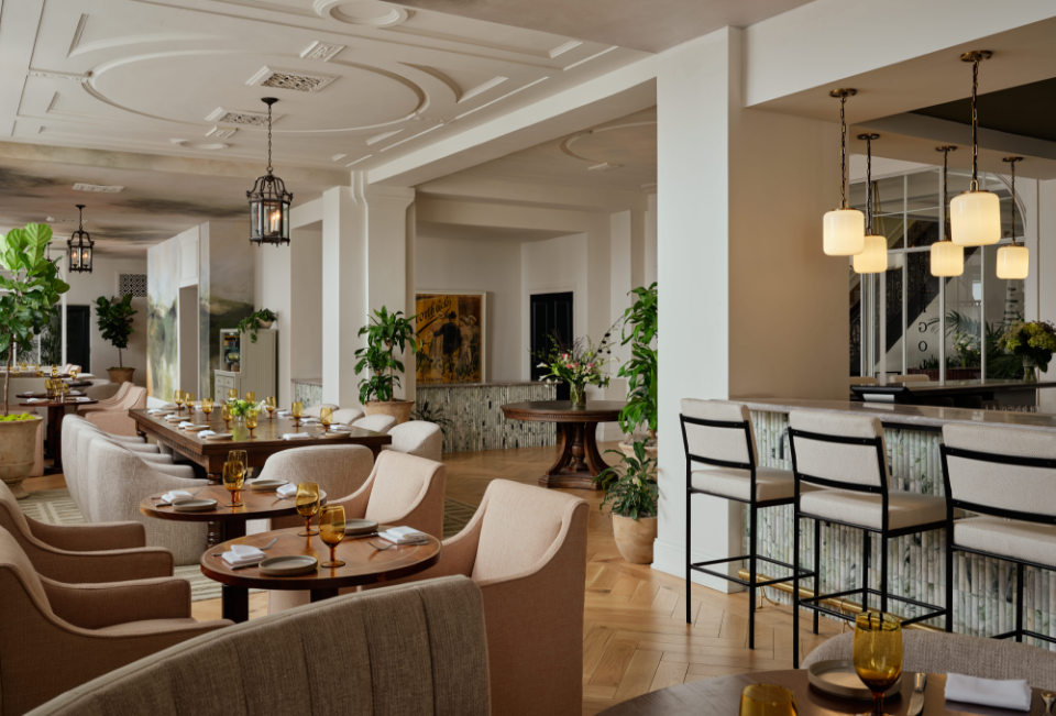 a room with tables and chairs