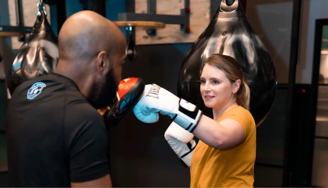 a man and woman boxing