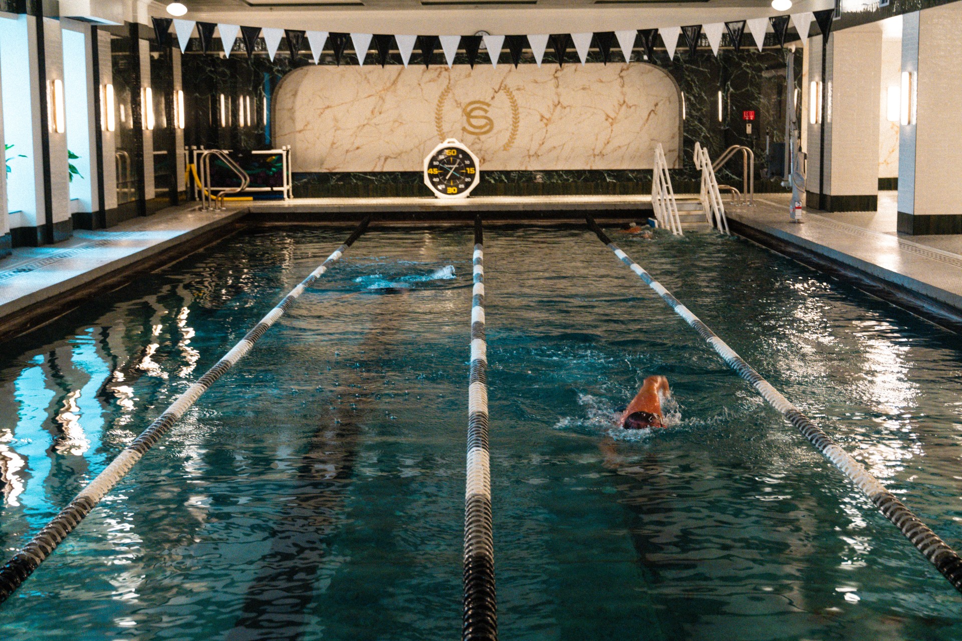 a person swimming in a pool