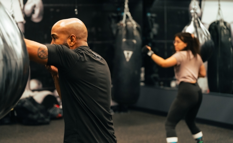 a man and woman in a gym
