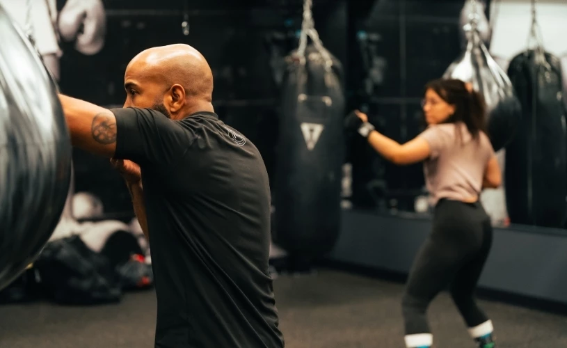 a man and woman in a gym