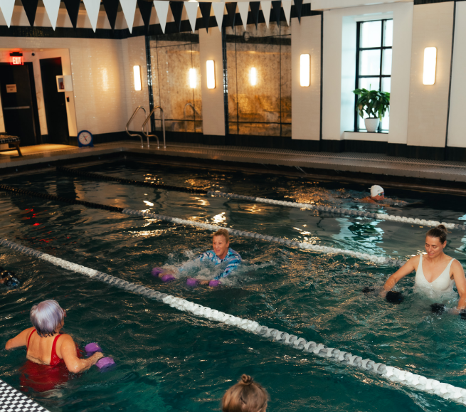 a group of people in a pool